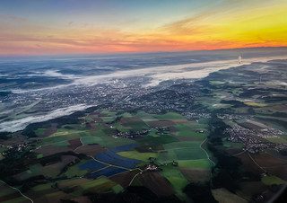 Aerial view of Freising Germany with morning sunrise on decent to Munich International Airport (MUC) Munich Germany