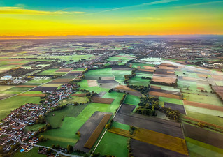 Aerial view of Bavarian landscape during morning sunrise on decent to Munich International Airport (MUC) Munich Germany