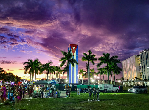 Surreal Miami Sunset by Chuck Diesel, miamicarnival caribbeanparade festival miamidadecountyfairexposition palmtrees cubanflag sunset purp