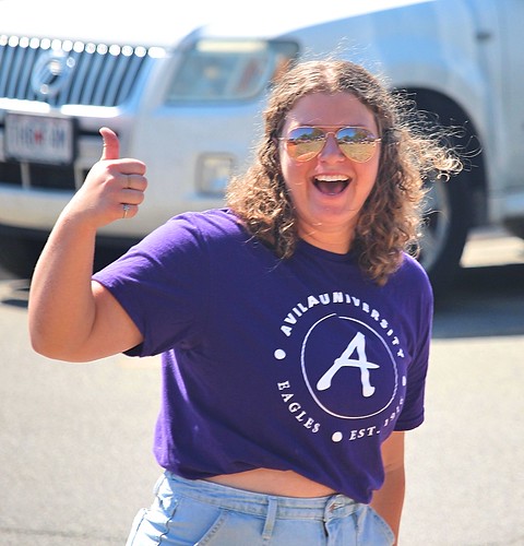 Tailgate student thumbs up