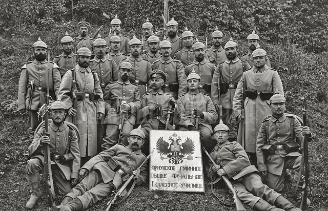 WW1 Saxon soldiers of LIR 101 with a captured Russian school sign, November 1914