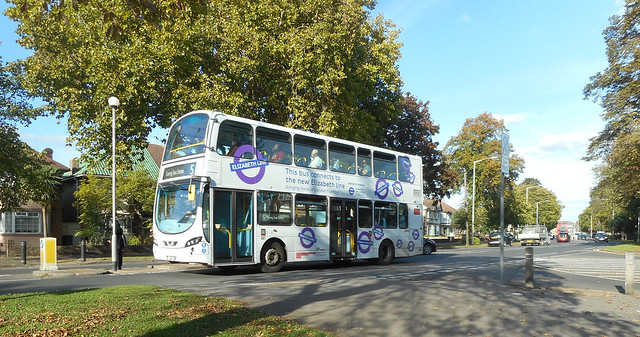 WHITE LONDON TRANSPORT BUS WITH ADVERTISING ON A LONDON STREET ENGLAND UK DSCN1646