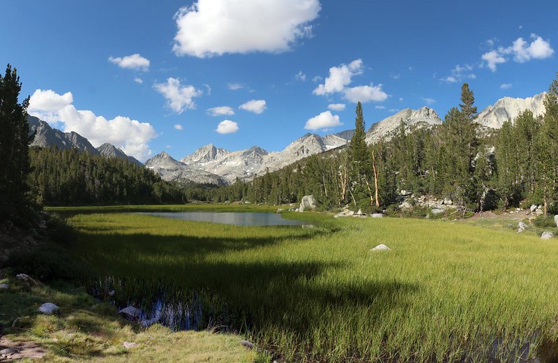 Marsh Lake in Little Lakes Valley, as cumulus clouds begin to form over the Sierra Crest