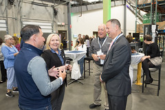 State Rep. Craig Fishbein and State Senator Paul Ciccarella speak with Beverly Catchpole, Chief Giving Officer, and Jason Jakubowski, President &amp; Chief Executive Officer of Connecticut Foodshare, during a tour of their Wallingford facility during a recent anniversary event.