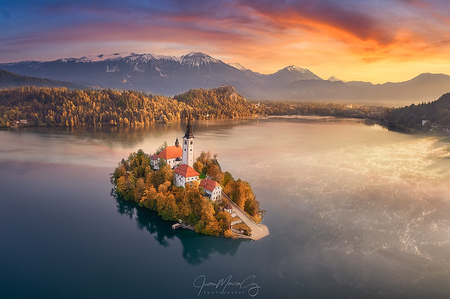 First lights during a foggy autumn sunrise at Lake Bled - Bled (Slovenia)