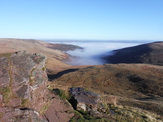 Fog in the valley: from red sandstone outcrop on ascent up Fan Fawr SWC Walk 401 - Storey Arms to Libanus or Circular (via Ystradfellte)