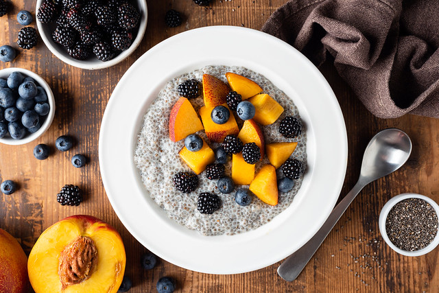 Chia pudding bowl with peach and blueberries