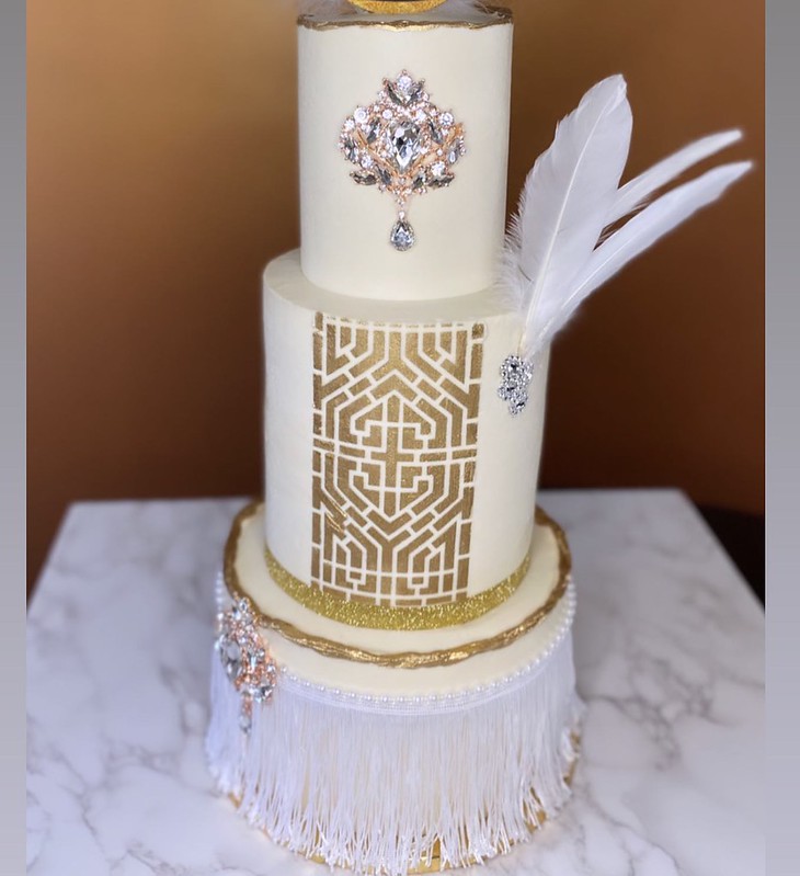 Cake by Crowned Sweets LLC