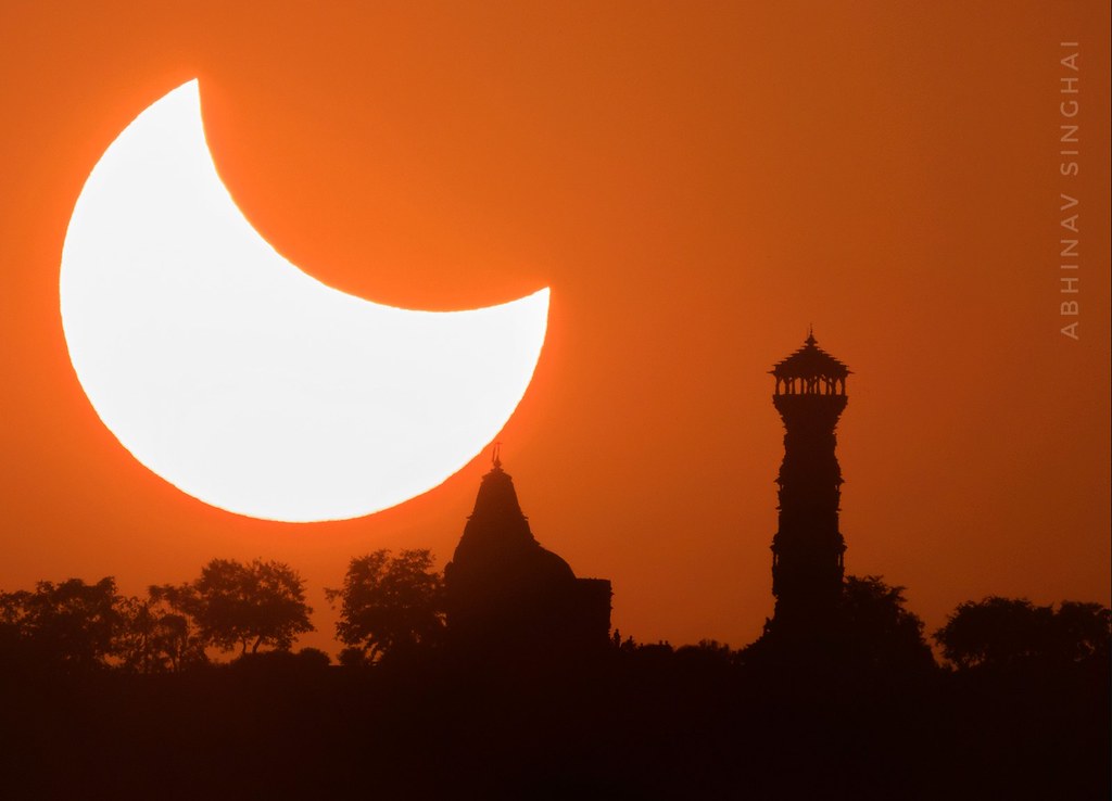 Partial Solar Eclipse over Kirti Stambh(Tower of Fame) and Jain Temple- Chittorgarh Fort , Rajasthan