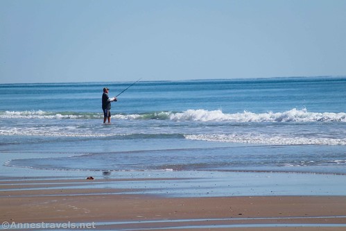 A fisherman in the surf on Topsail Beach, North Carolina