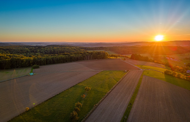 Sunset above the harvested fields