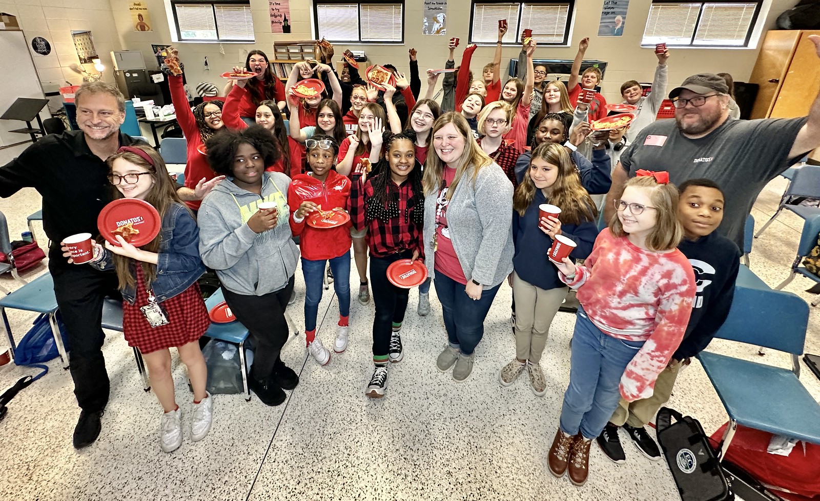 G100, Step One Auto and Donatos Surprise Effingham Middle School with a PIZZA Party