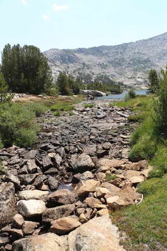 The outflow into the West Fork Bear Creek from Marie Lake was low in late July 2022 but we could hear the water