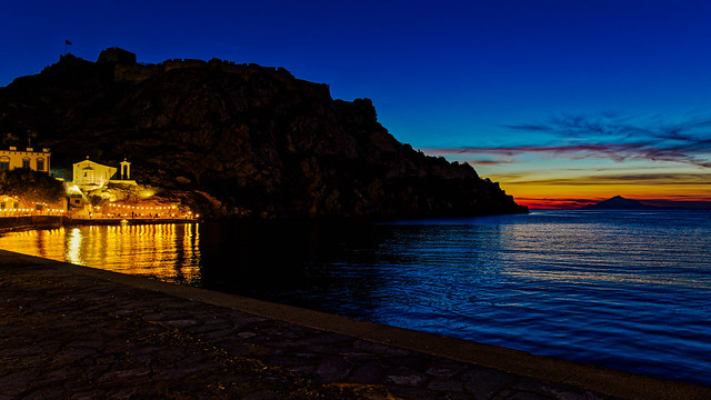 Almost Night - Dusk (Romeikos Gialos Seafront Area & Myrina Castle) Mount Athos (90km's in the Distance) Limnos - Greece (OM1 & Leica Summilux 10-25mm f1.7 Zoom)