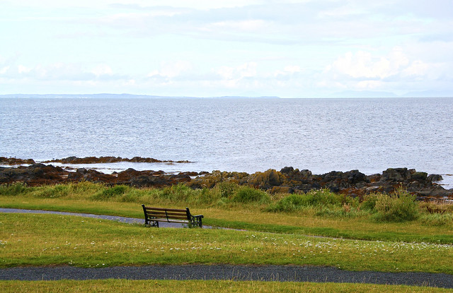 a lonesome bench at the sea