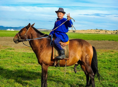 Horseback riding in Mongolia. From The Ultimate Destinations for Adventure Travel