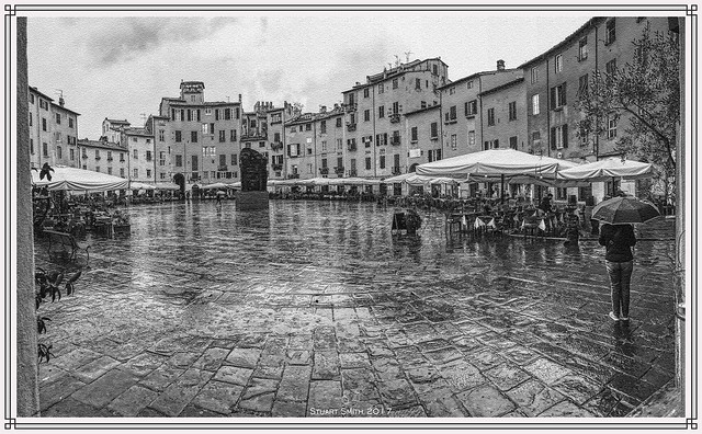 Alfresco in the Rain, Piazza dell'Anfiteatro, Lucca, Tuscany, Italy