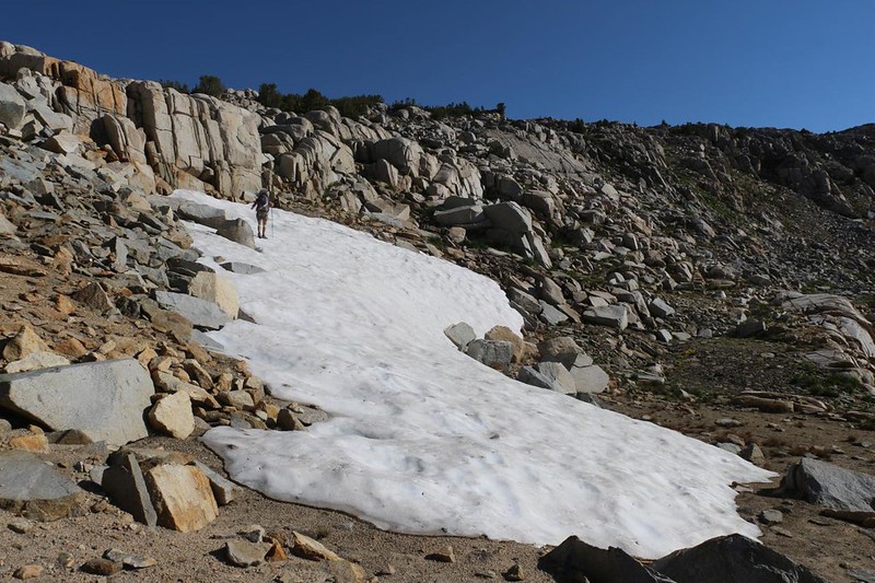 Vicki climbed up on top of the snowbank on the eastern side of Piute Pass, not far from the Piute Pass Trail