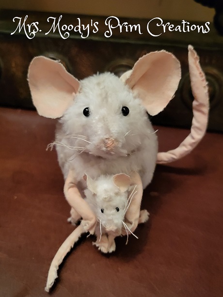 white momma mouse and baby