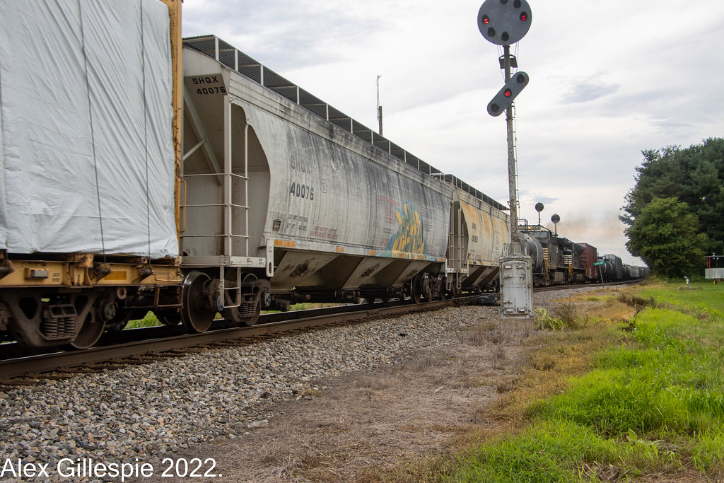 NW Signal 129-SHQX Hopper | SHQX Hopper heads east on the NS… | Flickr