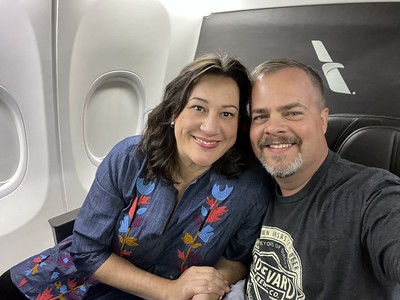 Carrie and John in First Class Enjoying Travel
