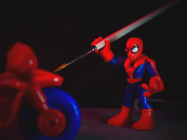 Spiderman Painting His Bike