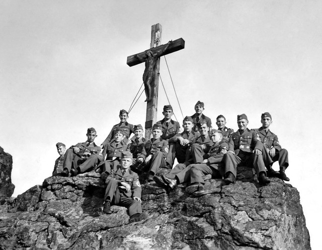 Members of the RAD from Zwiesel pose beneath a Gipfel on Großer Arber in Bavaria circa WW2