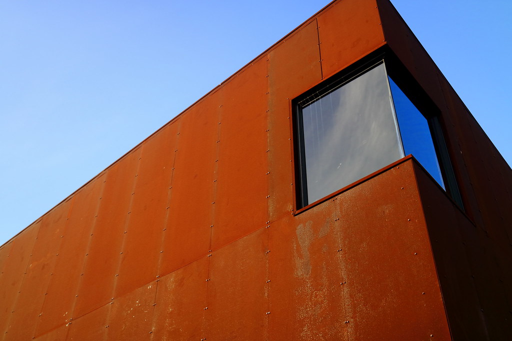Modern Architecture -  A New Building With Rusty Metallic Wall Plates
