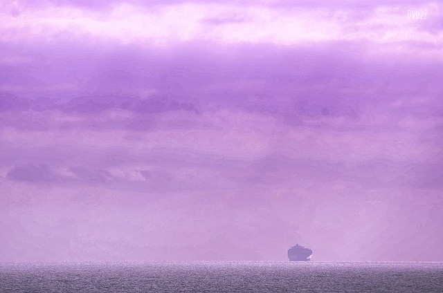 Incoming vessel under purple sky