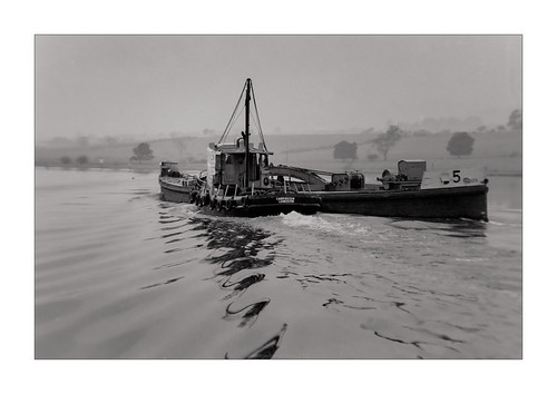 Life on the River by niggyl :), The MV Carrington and Dredging Barge No. 5 on a foggy Tamar River morning.

Another film archive ima