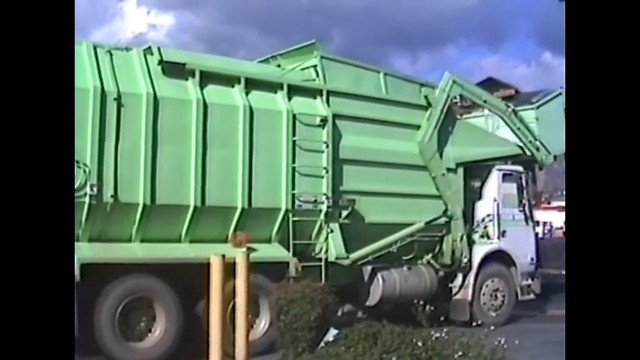 Some screenshots of a video I found ironically it happened to be my dad when he worked for Solid Waste