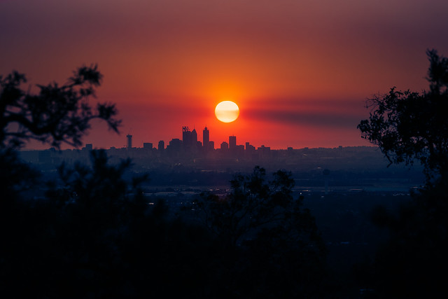 Bushfire sunset over the city