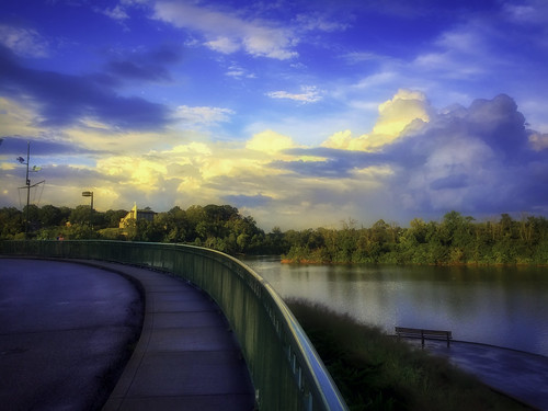 wintonwoods evening railing curve water lake clouds trees shoreline road sidewalk blue cincinnati ohio