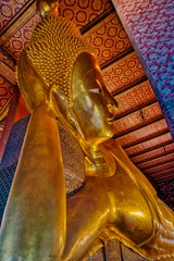 Giant reclining Buddha statue at Wat Pho in Bangkok, Thailand