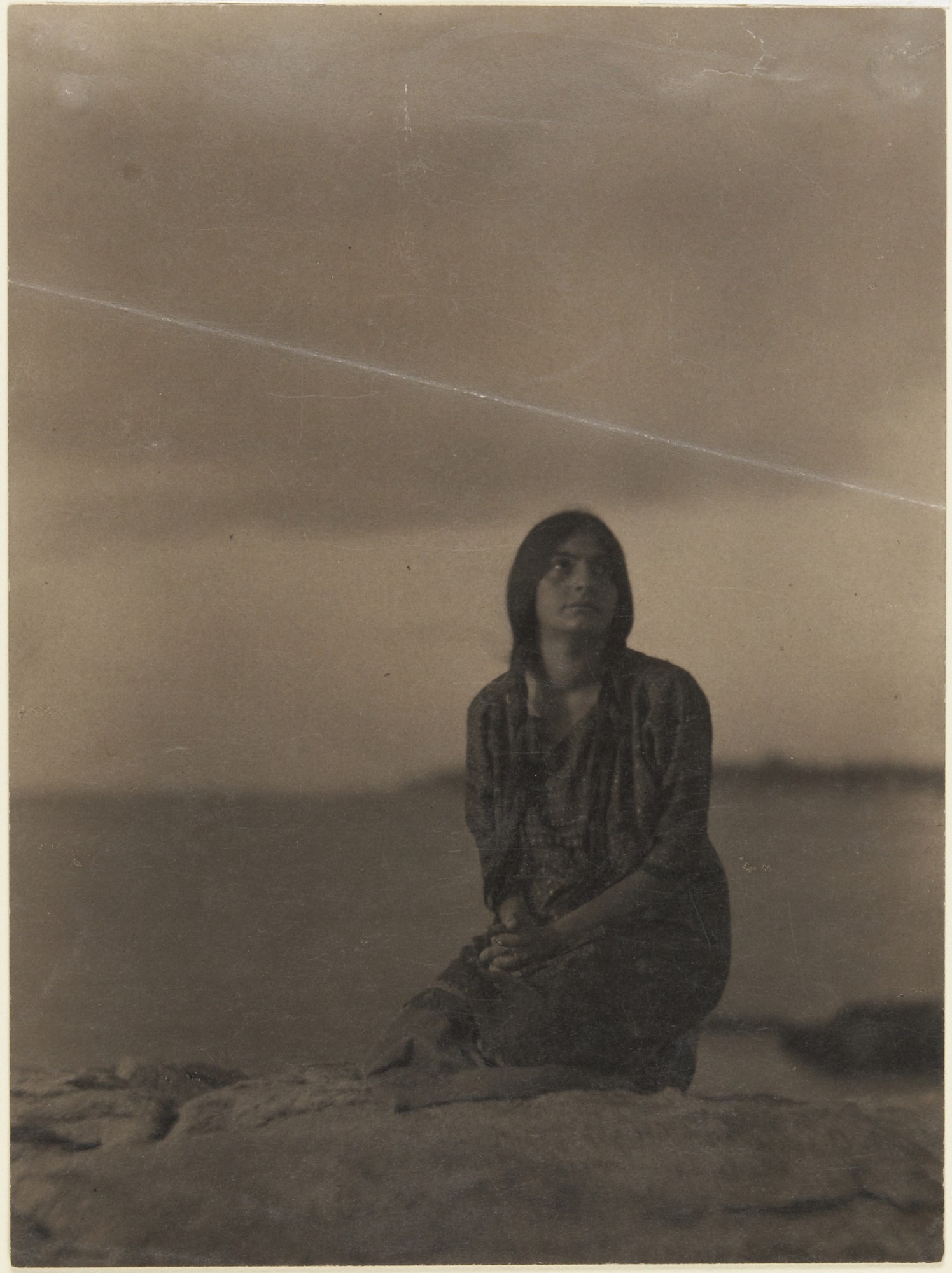 Clarence H. White :: Woman on rocks, Caritas Islands, Connecticut, 1909. Platinum print. | src Princeton Univ. Art museum