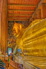 Giant reclining Buddha at Wat Pho in Bangkok, Thailand