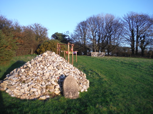 Fenced memorial tree and a cairn and tombstone for Harriet Tory; south of Ridge Hill SWC Walk 402 - Maiden Newton Circular or to Dorchester (via Cerne Abbas)