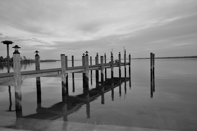 Still water pier reflections