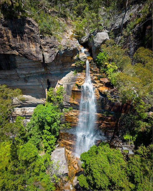Waterfall seen from Baltzer lookout (hanging rock). First image is captured with DJI Mini 3 at 24mm in vertical mode. The second is with 500mm zoom.