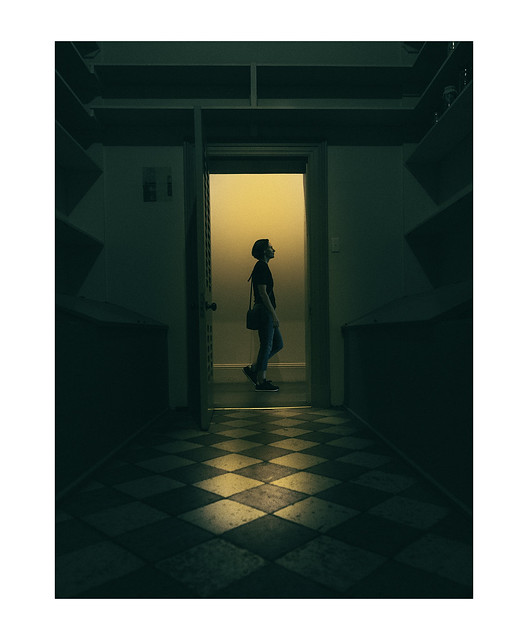 woman walking in corridor