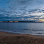 16. November 2022 - 5:38 - Sunrise, sea and clouds from Pearl Beach on the Central Coast, NSW, Australia.