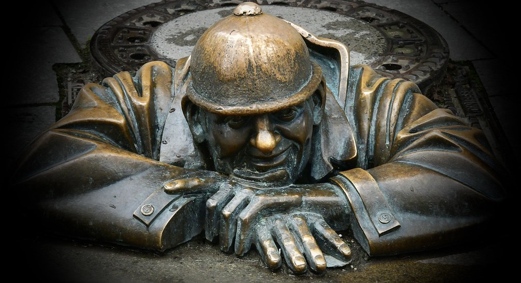 Bronze man in sewer. {EXPLORED Nov. 28, 2022}