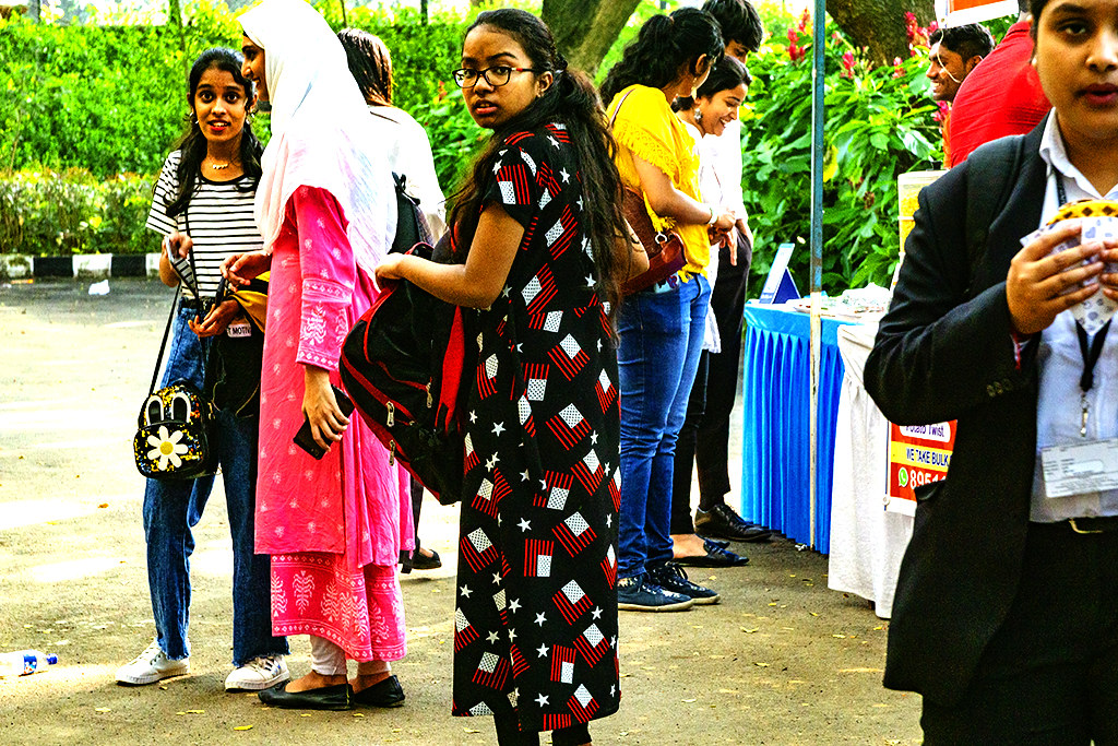 Girl in dress with modified American flags at Alliance University on 11-28-22--Bengaluru copy