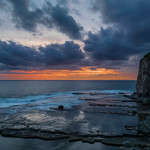 1. Detsember 2022 - 5:18 - Aerial sunrise seascape with clouds at The Skillion in Terrigal, NSW, Australia.
