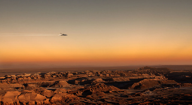 Spaceship flying over Planet Mars