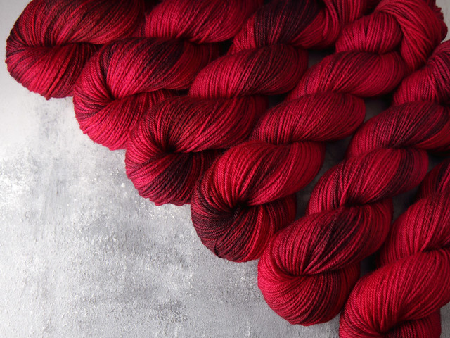 Dynamite DK pure British wool hand dyed yarn 100g – ‘Dahlia’ (deep reds)