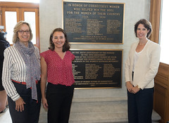 State Rep. Terrie Wood was joined by Tracy Marra and Jimm McCammon for the unveiling of a plaque honoring women of color and the advocacy for equal voting rights.
