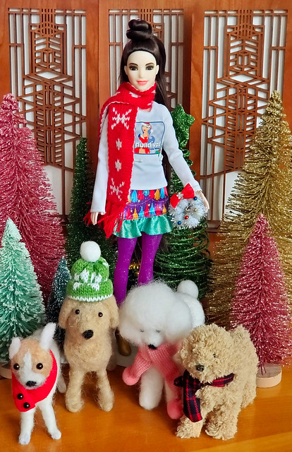 Topknot Confetti CR Barbie with her furry friends.