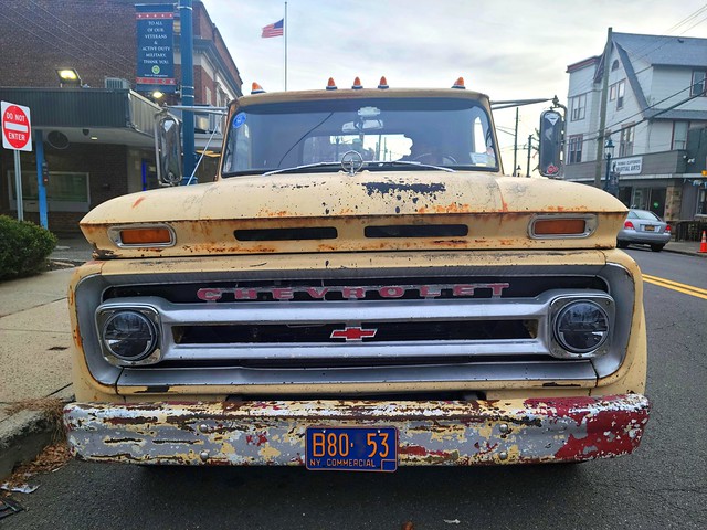 I was just strolling around town looking for some Christmas gifts, turned a corner and came upon this! Not something you see every day around here. A leaky, squeaky 1966 Chevy pickup truck with the original faded paint. Pearl River NY. Dec 2022.