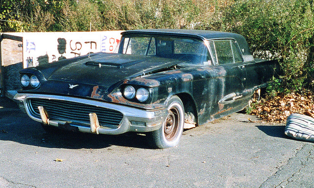 At last! A classic car that even I can afford in retirement years. A little Bondo, J&B Weld, duct tape, silicone calk and rattle-can spray paint should bring this old 1959 Ford Thunderbird back to life. Pearl River NY. May 2002.